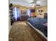 Comfortable bedroom features a large bed, wooden furniture, closet, ceiling fan and natural light at 701 Grandview Drive Dr, Durham, NC 27703