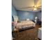 Bedroom with ceiling fan and a comfortable-looking bed at 701 Grandview Drive Dr, Durham, NC 27703