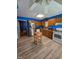 Spacious kitchen with stainless steel refrigerator, wood cabinets and modern appliances on a tile floor at 701 Grandview Drive Dr, Durham, NC 27703