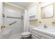 Bathroom with walk in shower, vanity, and updated fixtures at 714 W J St, Erwin, NC 28339