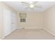 Bedroom with ceiling fan, window and closet at 714 W J St, Erwin, NC 28339