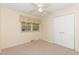 Bedroom with ceiling fan, window and closet at 714 W J St, Erwin, NC 28339