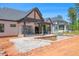 Exterior of home with an in-ground pool under construction in a spacious backyard at 7412 Wexford Woods Ln, Wake Forest, NC 27587