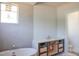 Bathroom with modern fixtures including a standalone tub, single vanity, and a separate toilet area at 7412 Wexford Woods Ln, Wake Forest, NC 27587