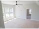 Large bedroom with multiple windows and ample space at 7412 Wexford Woods Ln, Wake Forest, NC 27587