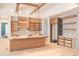 Unfinished kitchen with modern cabinetry, an island, and space for appliances ready to be customized at 7412 Wexford Woods Ln, Wake Forest, NC 27587