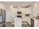 Stylish kitchen featuring white cabinets, stainless steel appliances, and a functional layout at 85 Queenstown Dr # 8, Princeton, NC 27542