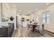 Bright eat-in kitchen featuring white cabinets, stainless appliances, and a cozy dining area at 85 Queenstown Dr # 8, Princeton, NC 27542