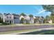 Street view of new construction homes with varying exterior colors and well-kept lawns at 85 Queenstown Dr # 8, Princeton, NC 27542