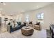 Spacious living room features modern furniture, neutral decor, and seamless flow to the kitchen at 85 Sunshine Rd # 4, Kenly, NC 27542