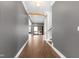 Hallway with wood floors and a view of the home's interior at 8621 Bishop Pine Ln, Wake Forest, NC 27587