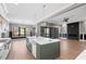 Open concept kitchen with modern appliances and seamlessly integrates with the living space at 8621 Bishop Pine Ln, Wake Forest, NC 27587