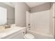 Bright bathroom featuring a sink, toilet, and bathtub with shower, all in a clean and modern design at 107 Rollingwood Cir, Kenly, NC 27542