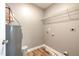A functional laundry room with essential appliances and storage, making laundry chores a breeze at 107 Rollingwood Cir, Kenly, NC 27542
