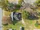 Aerial view of the home with a large lot and mature trees at 110 W Elm St, Nashville, NC 27856