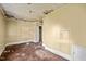 Bedroom featuring damage to the ceiling and walls that needs repairs at 110 W Elm St, Nashville, NC 27856