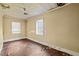 Bedroom with two windows bringing in lots of natural light at 110 W Elm St, Nashville, NC 27856