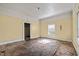 Living room has a door and window letting in natural light at 110 W Elm St, Nashville, NC 27856