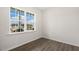 Bright bedroom with hardwood flooring and a large window at 139 Ethel Ln, Angier, NC 27501