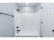 Bright white shower tub combo with black fixtures at 1729 Augustus Dr, Rocky Mount, NC 27801