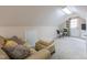 Finished attic features a table and chairs next to a walkout exit at 2010 Twin Acres Rd, Clayton, NC 27520