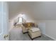Relaxing attic bedroom with comfortable seating at 2010 Twin Acres Rd, Clayton, NC 27520
