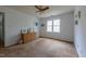 Bedroom with a bright window and natural light, featuring a woven dresser at 2010 Twin Acres Rd, Clayton, NC 27520