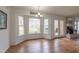 Bright eating area with bay window overlooking the backyard and a decorative chandelier at 2010 Twin Acres Rd, Clayton, NC 27520