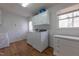 Laundry room features new washer and dryer, with storage, and lots of space at 2010 Twin Acres Rd, Clayton, NC 27520