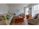 Inviting living room with hardwood floors and plenty of natural light from large windows at 2010 Twin Acres Rd, Clayton, NC 27520