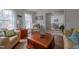Bright living room showing hardwood floors and view to a dining room at 2010 Twin Acres Rd, Clayton, NC 27520
