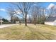 This large backyard features a shed and open space at 2605 Sumac Ln, Burlington, NC 27215