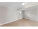 Bright basement with neutral paint and tiled floors at 2605 Sumac Ln, Burlington, NC 27215