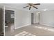 Basement featuring neutral paint, tiled floors, and a ceiling fan at 2605 Sumac Ln, Burlington, NC 27215