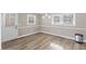 Cozy dining area with luxury vinyl plank flooring, natural light, and modern trim at 2605 Sumac Ln, Burlington, NC 27215
