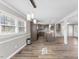 Modern kitchen with stainless steel appliances, tiled backsplash, island with granite countertop and bar at 2605 Sumac Ln, Burlington, NC 27215