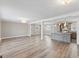 Bright open-concept living room with gorgeous floors and an adjacent island kitchen at 2605 Sumac Ln, Burlington, NC 27215