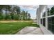 Backyard featuring a green lawn and side view of house at 421 Citron St, Sanford, NC 27332