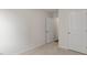 Bedroom with neutral walls, plush carpet, an open doorway, and a closet at 425 Citron St, Sanford, NC 27332