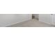 Clean bedroom features neutral colored carpet and a view into the hallway at 425 Citron St, Sanford, NC 27332