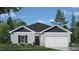 Charming single-story home with gray siding, black door, black shutters, attached garage, and well-manicured landscaping at 425 Citron St, Sanford, NC 27332