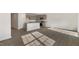 Open concept kitchen with granite countertops and stainless appliances overlooking the living area at 425 Citron St, Sanford, NC 27332