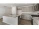 Spacious kitchen featuring an island, granite countertops, and stainless steel appliances at 425 Citron St, Sanford, NC 27332
