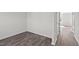 Bedroom featuring luxury vinyl plank flooring, and natural paint at 429 Citron St, Sanford, NC 27332