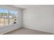 Carpeted bedroom featuring large double windows at 429 Citron St, Sanford, NC 27332