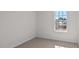 This bedroom features natural light and neutral carpet at 429 Citron St, Sanford, NC 27332
