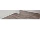 Luxury vinyl plank flooring with baseboard trim at 429 Citron St, Sanford, NC 27332