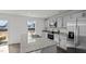 Kitchen showcasing granite countertops, stainless appliances, and a large island with sink at 429 Citron St, Sanford, NC 27332
