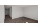 Well lit living room featuring luxury vinyl plank flooring and neutral paint at 429 Citron St, Sanford, NC 27332