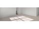 Sunlit bedroom with neutral carpet and an open layout at 433 Citron St, Sanford, NC 27332